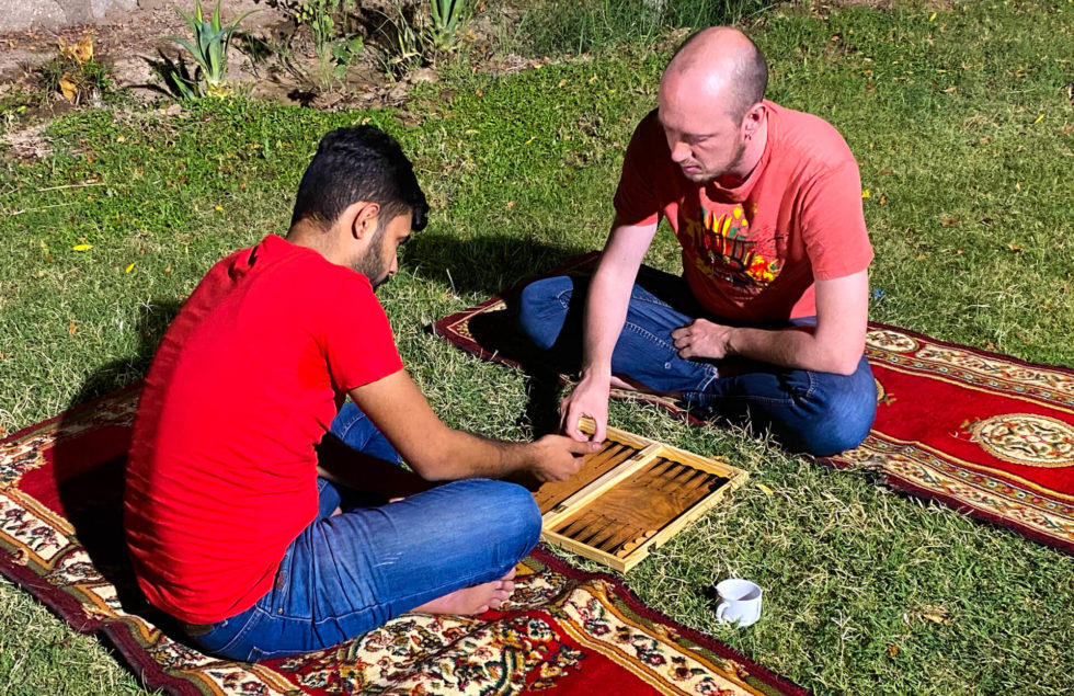 Me and a friend of Haydir's playing backgammon in Haydir's family's garden.