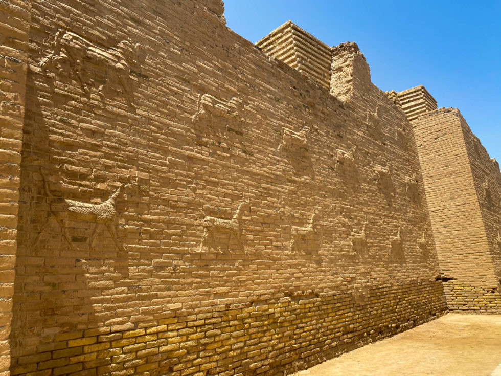 A section of the lower part of the Ishtar gate, made of brick, with carvings of Marduk.
