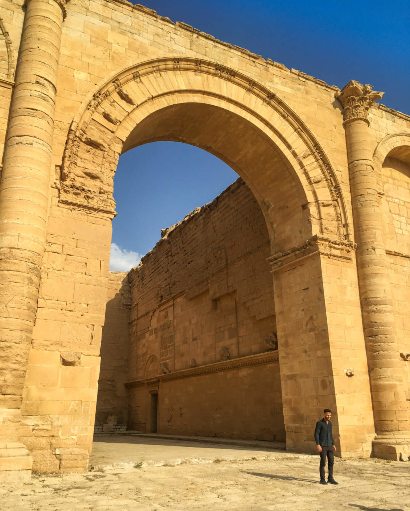 Huge arch with an Iraqi friend standing in front