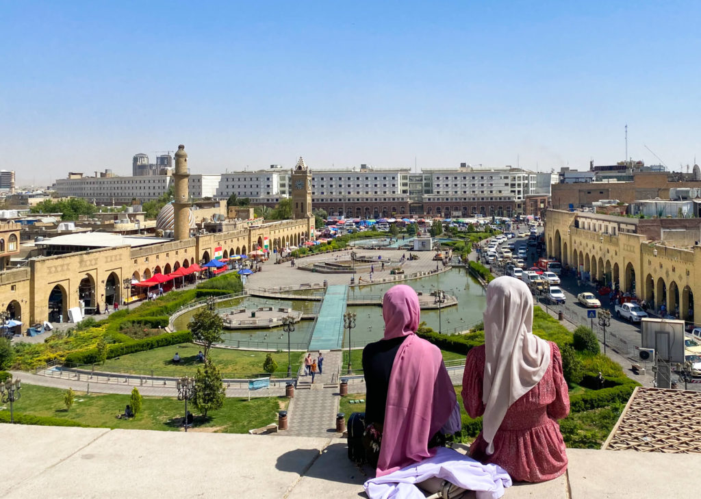 Two Iraqi girls admiring Erbil's main square from the citadel.