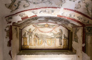 An ornately decorated tomb at the Catacombs of Kom el Shoqafa, with colourful paintings